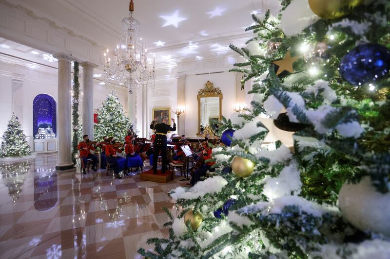 Members of the US Marine Band play holiday music in the Grand Foyer. Reuters