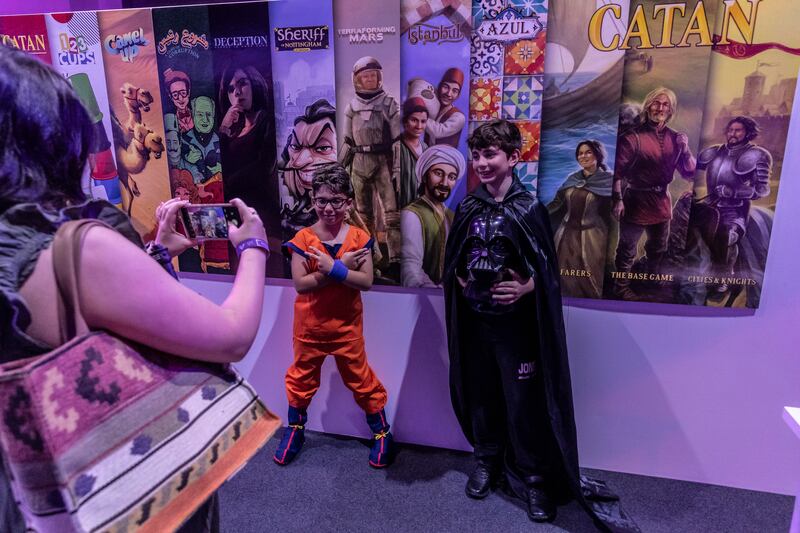 Cosplayers show up as Goku from Dragon Ball Z and Darth Vader from Star Wars 