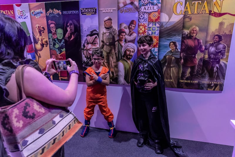 Cosplayers show up as Goku from Dragon Ball Z and Darth Vader from Star Wars 