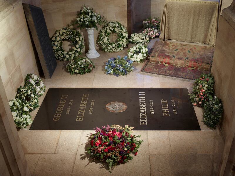 The photo released by Buckingham Palace of the ledger stone at the King George VI Memorial Chapel in St George's Chapel, Windsor Castle. PA via AP