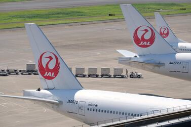 Japan Airlines planes at at Tokyo's Haneda airport. Carrier is forming a joint venture with China Eastern. AFP 