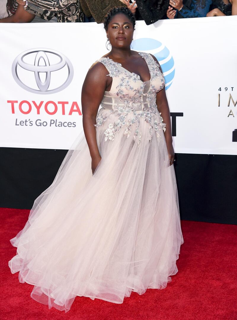 Orange is the New Black star Danielle Brooks wore an ethereal blush pink design by Project Runway alum Michael Costello. AP / Richard Shotwell