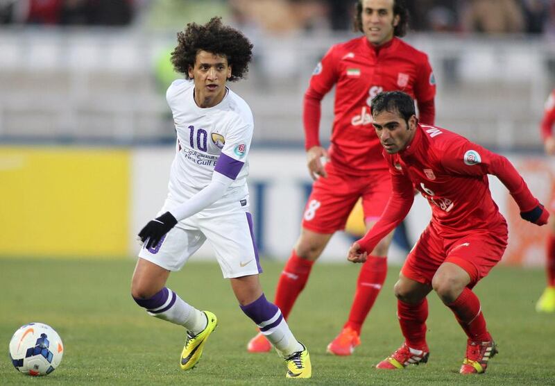 Al Ain's Omar Abdulrahman, left, pictured during an Asian Champions League against Iran's Tractor Sazi at Yadegar Emam Stadium in Tabriz on April 1, 2014, is reportedly on the radar of several European clubs. AFP