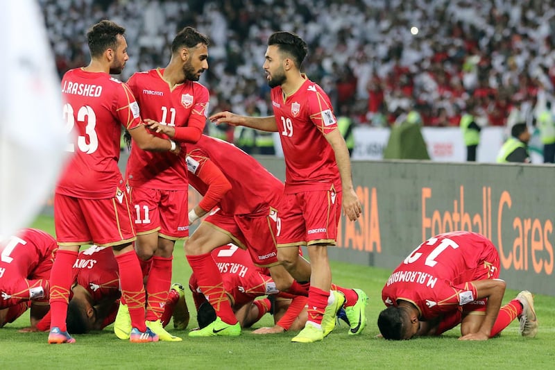 Players of Bahrain celebrate a goal. EPA