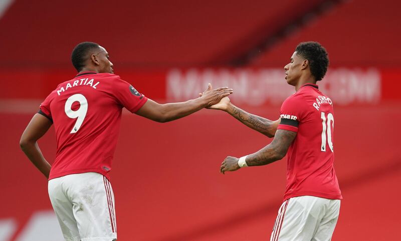Marcus Rashford of Manchester United with team mate Anthony Martial. EPA
