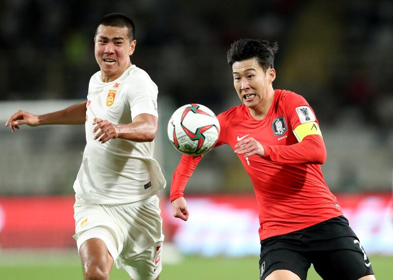 Soccer Football - AFC Asian Cup - South Korea v China - Group C - Al Nahyan Stadium, Abu Dhabi, United Arab Emirates - January 16, 2019  South Korea's Son Heung-Min in action with China's Yiming Liu   REUTERS/Suhaib Salem