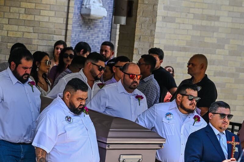 Pallbearers carry the coffin of Amerie Jo Garza, who died in the mass shooting at Robb Elementary School. AFP