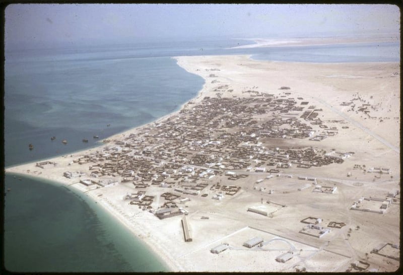 Abu Dhabi town 1963 
An aerial view of the town. At the bottom centre right of the photograph is the new HM Political Agency compound. Photo by David Riley