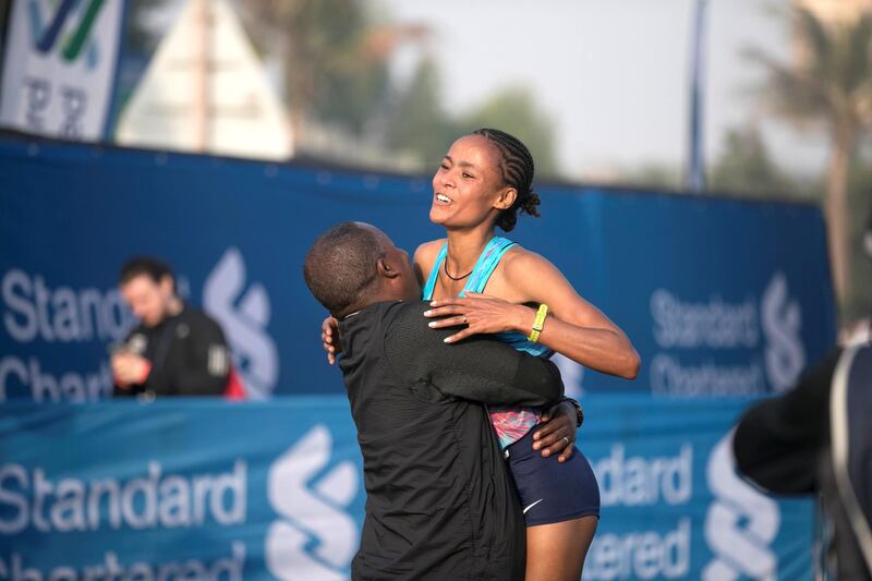 DUBAI, UNITED ARAB EMIRATES - Jan 26, 2018. 

Roza Dereje completed the Ethiopian double in the race for a seventh successive year by running away with the women’s event also in a new course record time of 2h: 19m:17s at the Standard Chartered Dubai Marathon. 

(Photo by Reem Mohammed/The National)

Reporter: Amith
Section: NA + SP