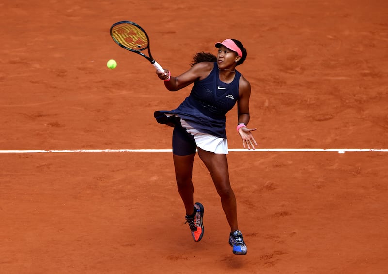 Naomi Osaka in action during her first round match against Lucia Bronzetti. Reuters