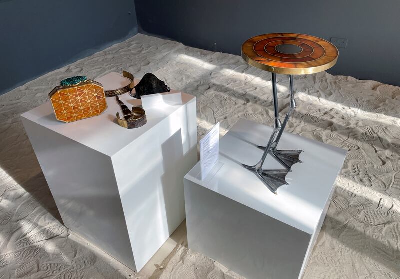 The duck a l’orange, right, is a limited edition collectible side table made using orange leather.