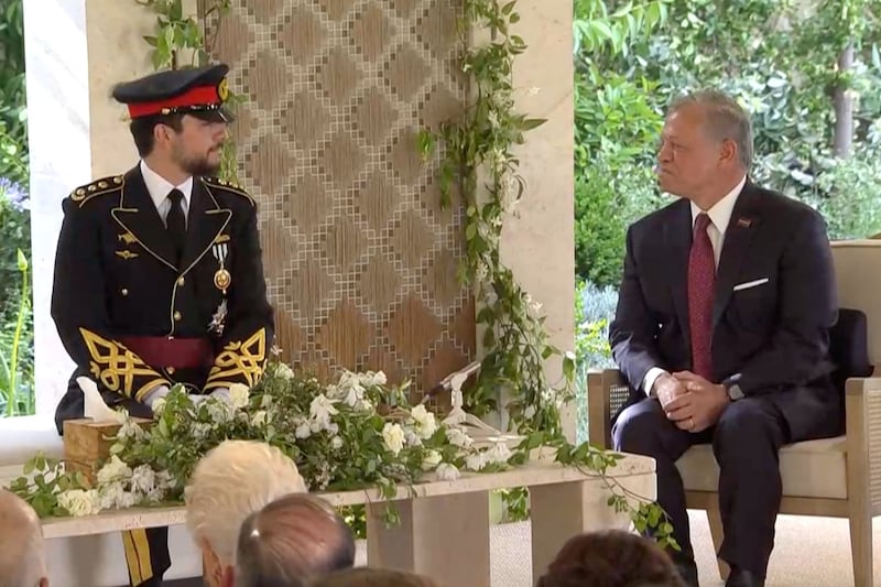 Prince Hussein and his father await the bride's arrival. Reuters