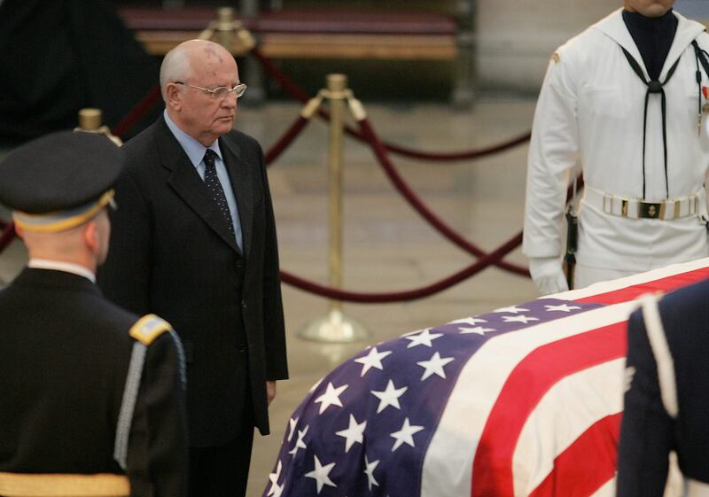 Gorbachev pauses in front of Reagan's casket during his funeral in the Capitol Rotunda in Washington, June 10, 2004. EPA