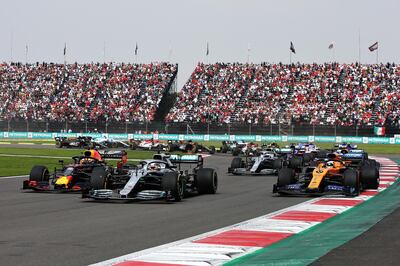 MEXICO CITY, MEXICO - OCTOBER 27: Max Verstappen of the Netherlands driving the (33) Aston Martin Red Bull Racing RB15 and Lewis Hamilton of Great Britain driving the (44) Mercedes AMG Petronas F1 Team Mercedes W10 battle for position at the start during the F1 Grand Prix of Mexico at Autodromo Hermanos Rodriguez on October 27, 2019 in Mexico City, Mexico. (Photo by Charles Coates/Getty Images)
