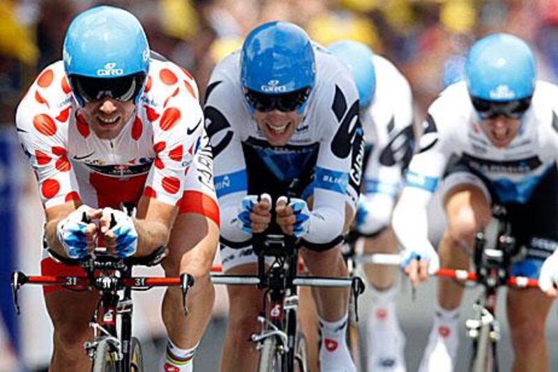 Garmin rider Thor Hushovd, left, leads his teammates during the team time trial on the second stage of the Tour yesterday.