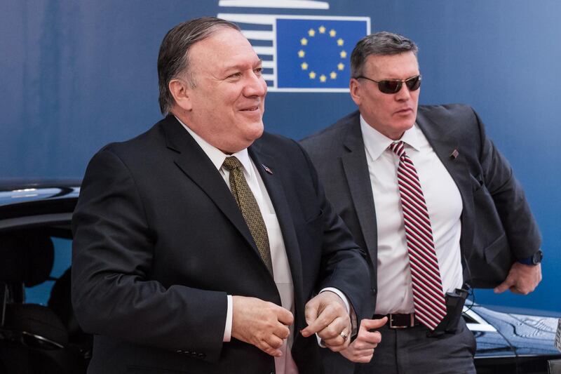 Mike Pompeo, U.S. secretary of state, left, arrives in Brussels, Belgium, on Monday, May 13, 2019. Pompeo made a surprise visit to Brussels as European Union foreign ministers meet to discuss ways to salvage the landmark Iran nuclear accord that Washington has abandoned. Photographer: Geert Vanden Wijngaert/Bloomberg