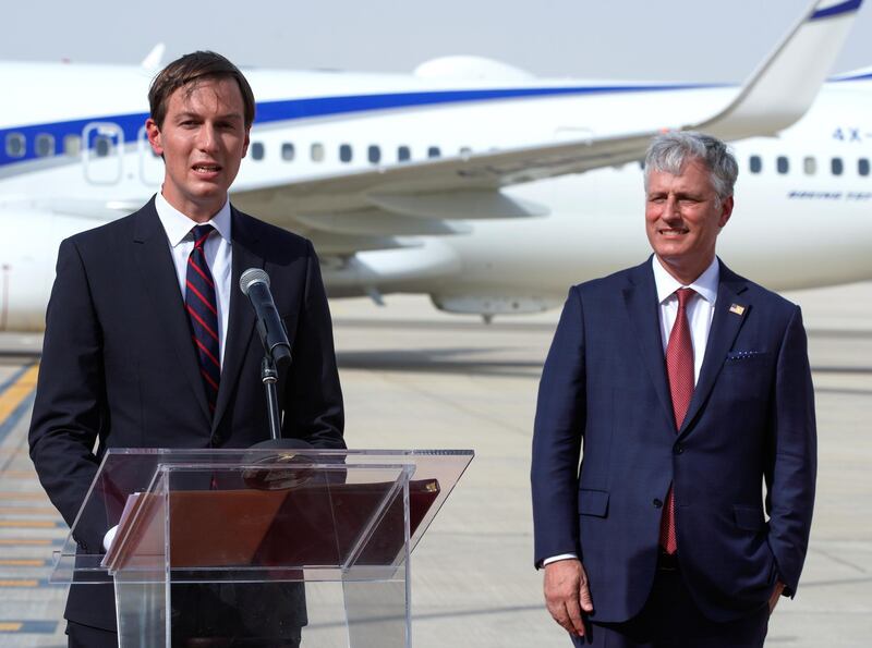 Abu Dhabi, United Arab Emirates, August 31, 2020. Senior White House adviser Jared Kushner, right, says some words upon arrival as US National Security Adviser Robert O'Brien looks on after disembarking the El Al's flight in Abu Dhabi.
Victor Besa /The National
Section:  NA
Reporter:  Khaled Owais