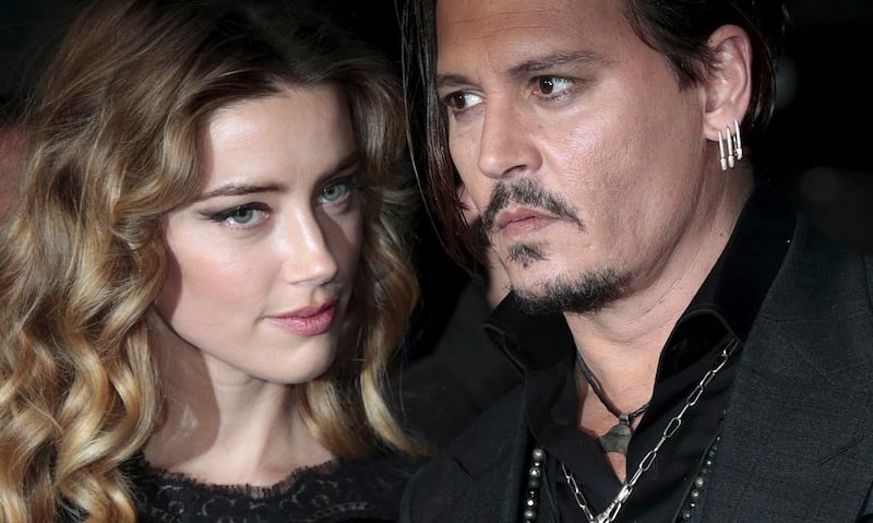Johnny Depp and Amber Heard arrive for the British premiere of the film 'Black Mass' in London, Britain, on October 11, 2015. Reuters 