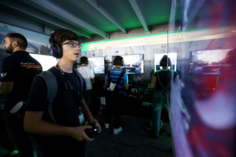 A gamer plays Tom Clancy's The Division during Games 15 Middle East at the International Marine Club in Dubai. Christopher Pike / The National