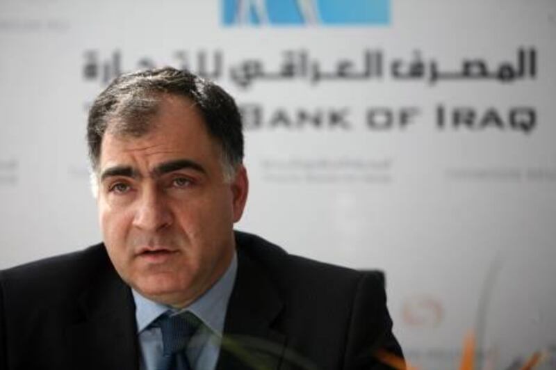 DUBAI, UNITED ARAB EMIRATES - November 25:  Hussein Al-Uzri, chairman of the Trade Bank of Iraq, speaking during a press conference held to announce that the Trade Bank of Iraq will join Thomson Reuters global foreign exchange trading system, at the Jumeirah Emirates Tower Hotel in Dubai on November 25, 2009.  (Randi Sokoloff / The National)  For Business story by Bradley Hope *** Local Caption ***  RS008-112509-IRAQ BANK.jpg