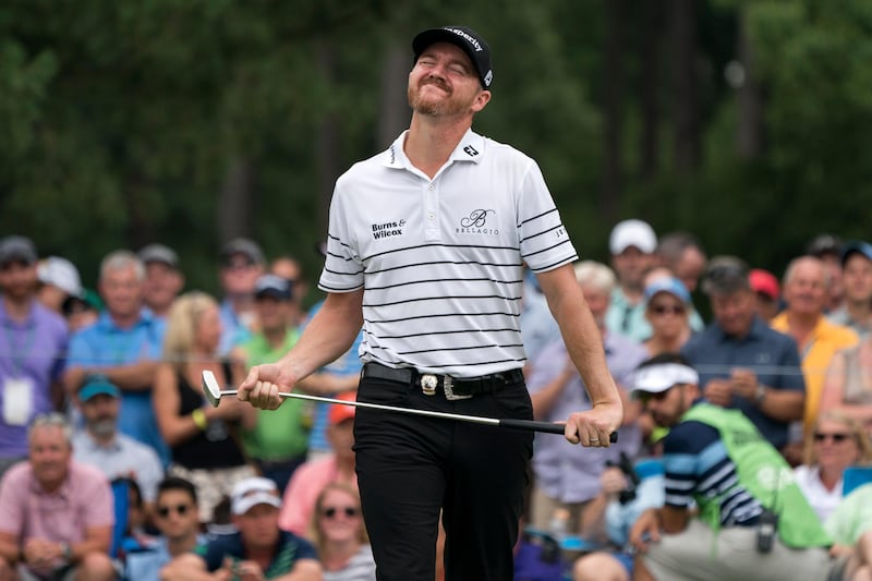 Jimmy Walker of the US reacts to missing a putt on the ninth green. Shawn Thew / EPA