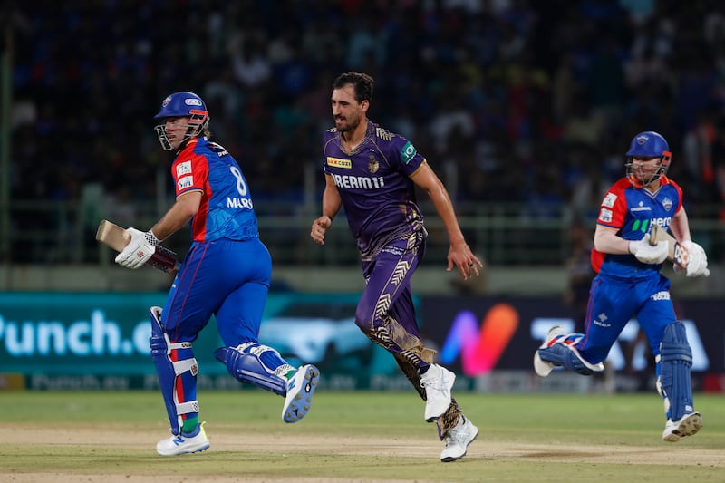 Kolkata Knight Riders' Mitchell Starc, centre, picked up two wickets against Delhi Capitals in Visakhapatnam. AP