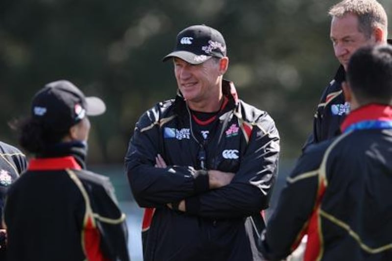 John Kirwan, the coach of Japan, centre, is from New Zealand and played for the All Blacks.