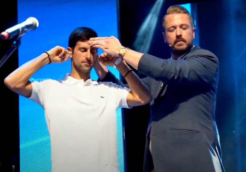 Mind2Mind performing with Novak Djokovic.