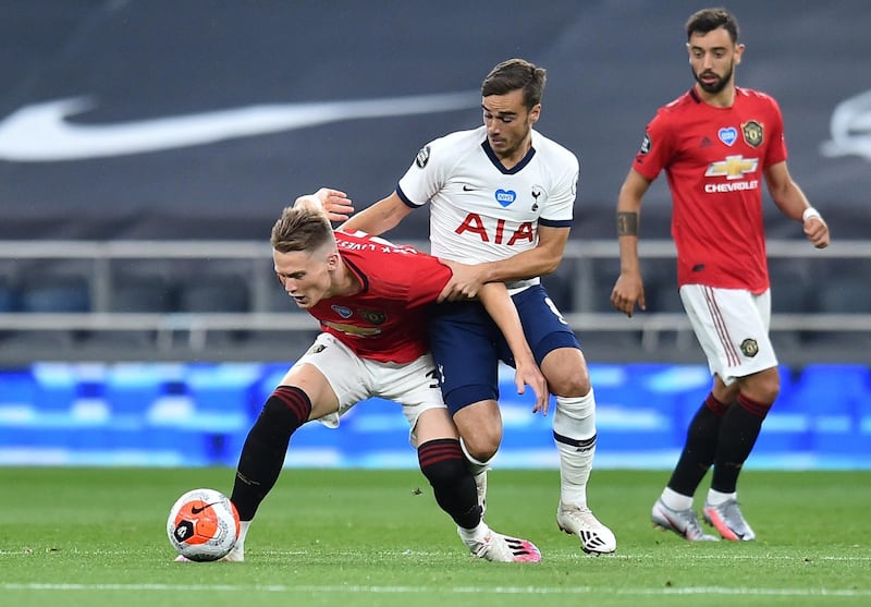 Scott McTominay tussles with Tottenham's Harry Winks. Reuters