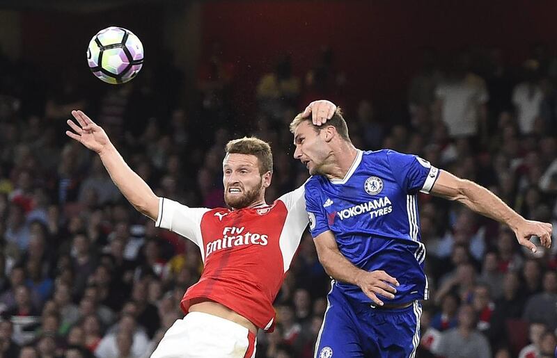 Arsenal’s Shkodran Mustafi comes up against Chelsea’s Branislav Ivanovic during the English Premier League match between Arsenal and Chelsea at the Emirates in London. EPA