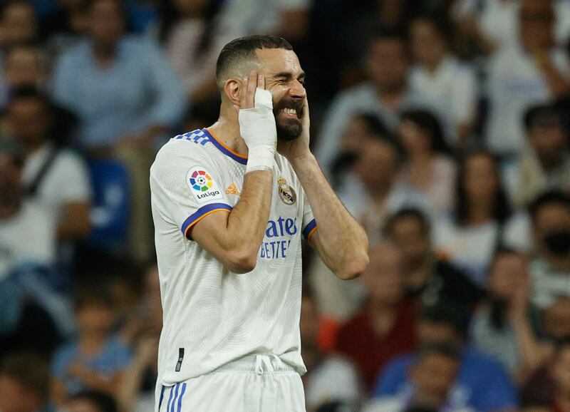 Real Madrid's Karim Benzema after missing a chance. Reuters