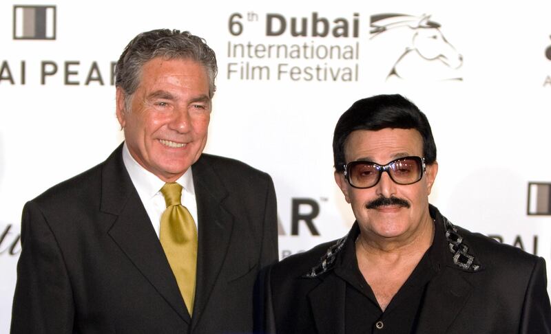 Dubai - December 10, 2009 - Egypitan actor Mostafa Fahmi (L) and Egyptian comedian Samir Ghanem (R) pose for photographers on the red carpet during the amfAR event as part of the Dubai International Film Festival in Dubai, December 10, 2009.  (Photo by Jeff Topping/The National)
 *** Local Caption ***  JT014-1210-AMFAR_F8Q5645.jpg