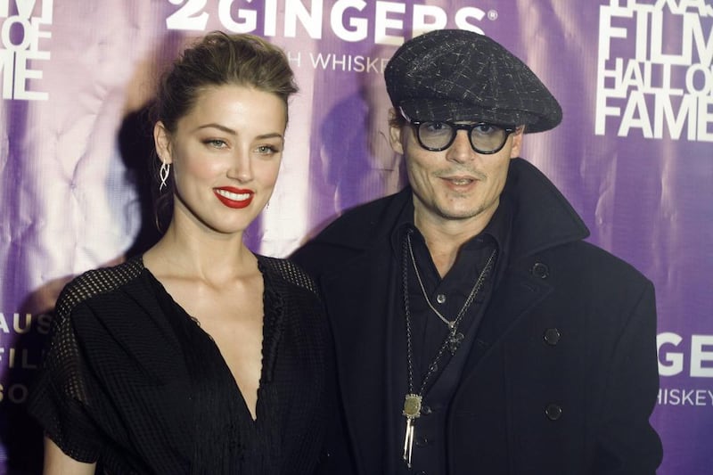 Heard and Depp in better times. AP