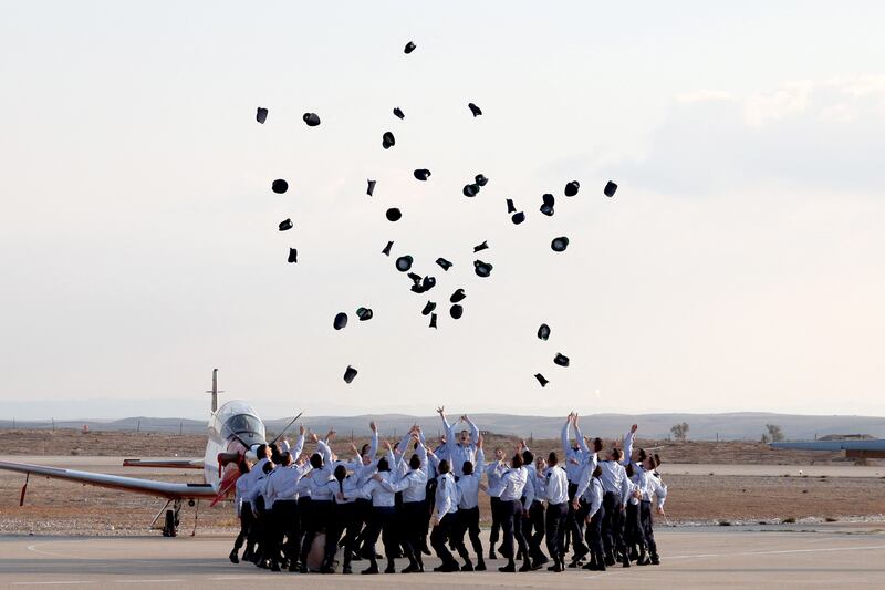 Israeli Air Force pilots celebrate at their graduation ceremony at the Hatzerim base in the Negev desert. AFP
