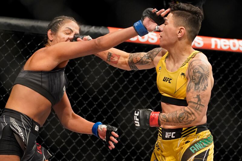 Jessica Andrade, left, hits Cynthia Calvillo. AP Photo