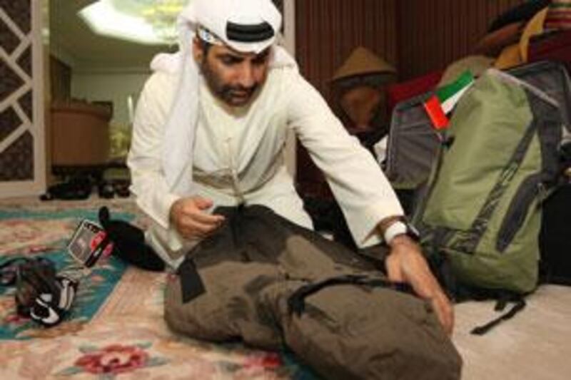 Sheikh Abdulaziz bin Ali bin Rashed Al Nuaimi prepares for his trek.