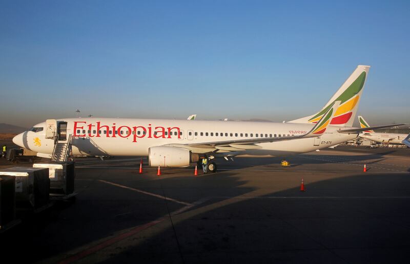 FILE PHOTO: Workers service an Ethiopian Airlines Boeing 737-800 plane at the Bole International Airport in Ethiopia's capital Addis Ababa, January 26, 2017. REUTERS/Amr Abdallah Dalsh/File Photo