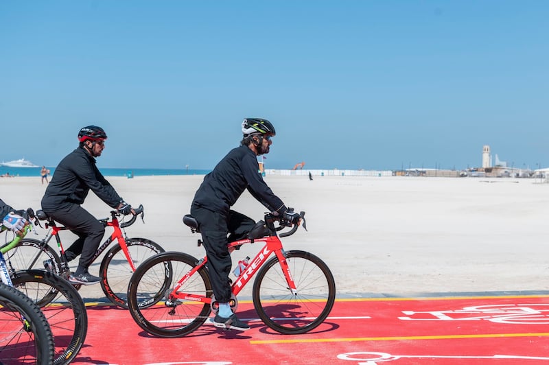 Sheikh Mohammed bin Rashid cycling along the new path at Jumeirah Beach on Wednesday. Twitter/HHShkMohd