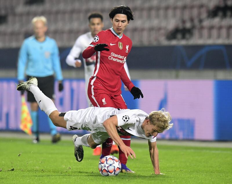 Takumi Minamino - 5: The Japanese chased around the midfield but too much of his energy was unfocused. He sent in an excellent cross for Jota on one of his raids forward and was unlucky to have a goal disallowed. Reuters