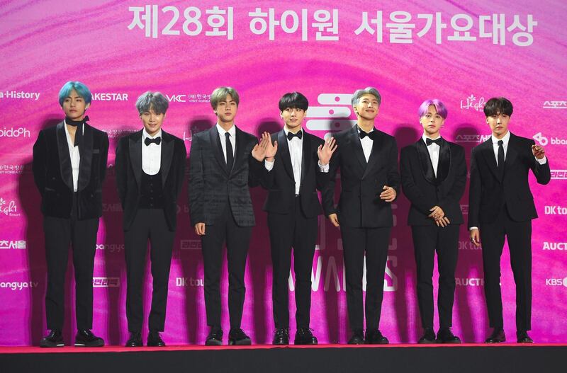 (FILES) In this file photo South Korean boy band BTS, also known as the Bangtan Boys, pose on the red carpet at the 28th Seoul Music Awards in Seoul on January 15, 2019. Legions of K-pop fans and TikTok users are taking credit for upending Donald Trump's weekend rally after block-reserving tickets with no intention to attend an event that was beset by an embarrassingly low turnout. / AFP / Jung Yeon-je / TO GO WITH AFP STORY by Maggy DONALDSON: "Online disruption of Trump rally highlights K-pop's political hustle"
