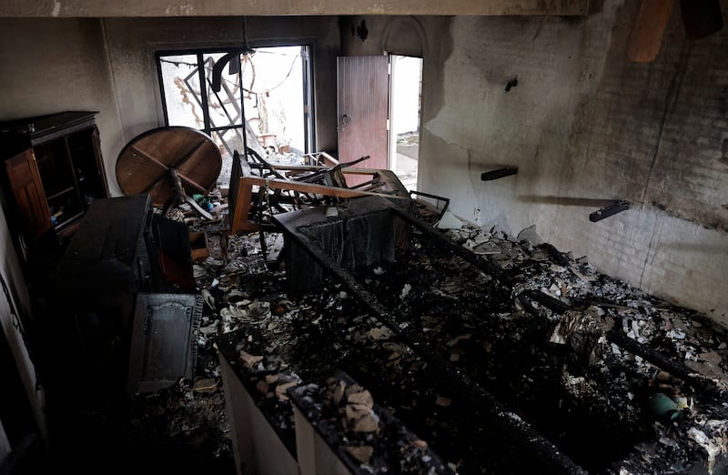 Part of the private residence of Prime Minister Ranil Wickremesinghe was burnt by demonstrators. Reuters
