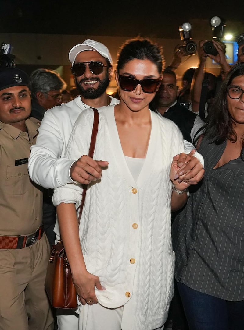 Bollywood actors Ranveer Singh and Deepika Padukone lead the celebrities and business leaders arriving at Jamnagar Airport for the Ambani pre-wedding celebrations. AFP
