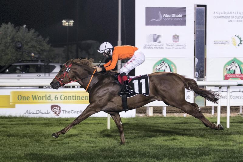 ABU DHABI, UNITED ARAB EMIRATES - Jan 14, 2018. 
Jockey Connor Beasley, leads Treasured Times (IRE) to the win at Abu Dhabi Horse Racing Championship 

(Photo by Reem Mohammed/The National)

Reporter:  Amith Passela
Section: SP