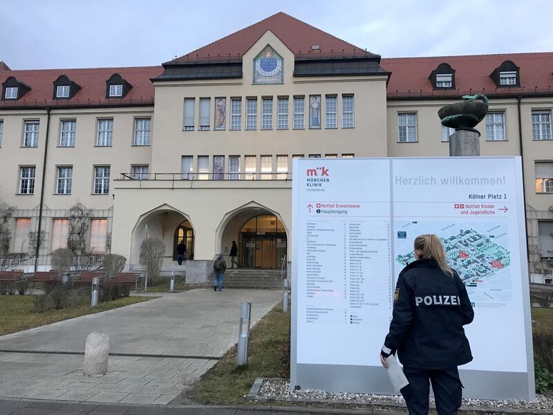 A police officer looks at a clinic map of the Klinikum Schwabing, after Germany has declared its first confirmed case of the deadly coronavirus that broke out in China, in Munich, Germany. Reuters