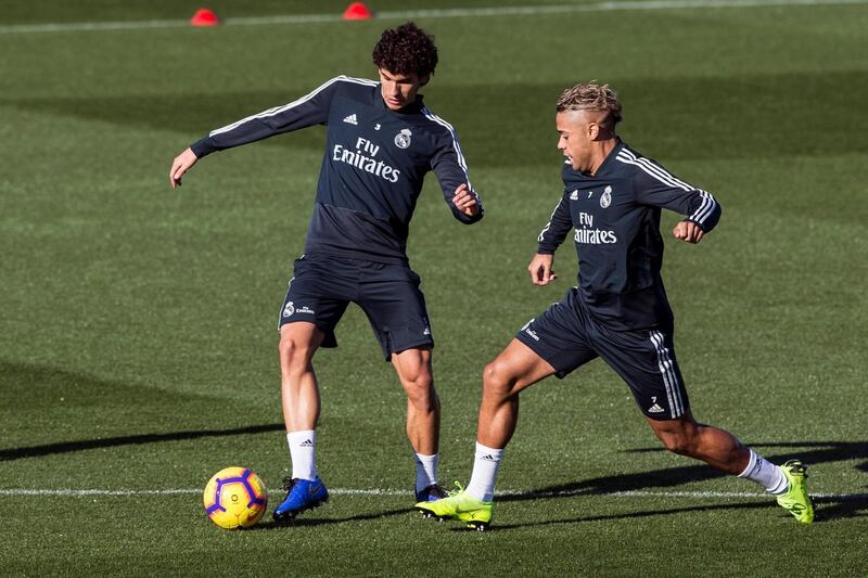 Mariano Diaz, right, and Jesus Vallejo take part in a training session ahead of Real Madrid's La Liga clash with Eibar on Saturday. EPA