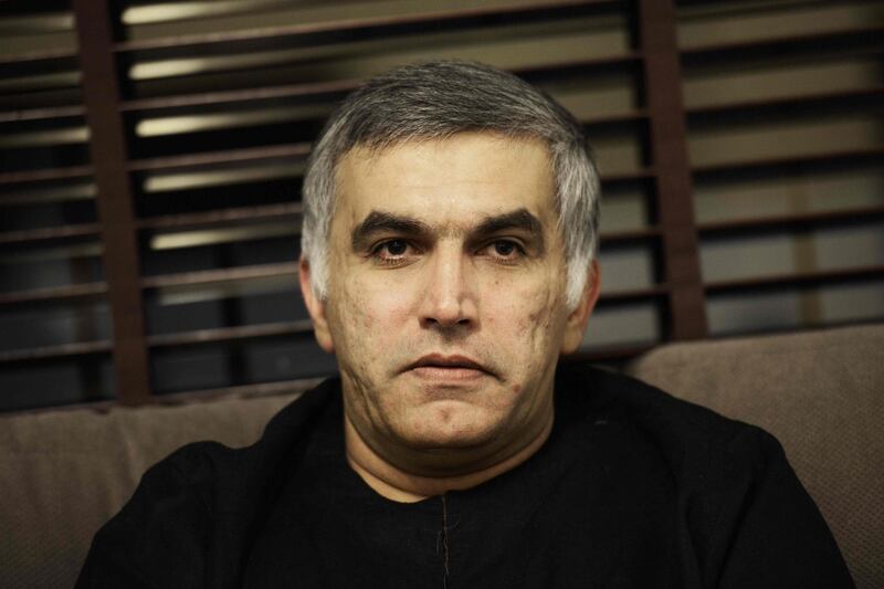 (FILES) In this file photo taken on November 2, 2014 Bahraini human rights activist Nabeel Rajab sits at his home in the village of Bani Jamrah, West of Manama. Bahrain's supreme court, whose verdicts are final, on December 31, 2018 upheld a five-year jail term against the prominent activist for writing tweets deemed offensive to the state, a judicial source said. Rajab, a high-profile rights activist who is already serving a two-year term in another case, was first handed the sentence in February by a lower court and an appeals court confirmed it in June.
 / AFP / MOHAMMED AL-SHAIKH

