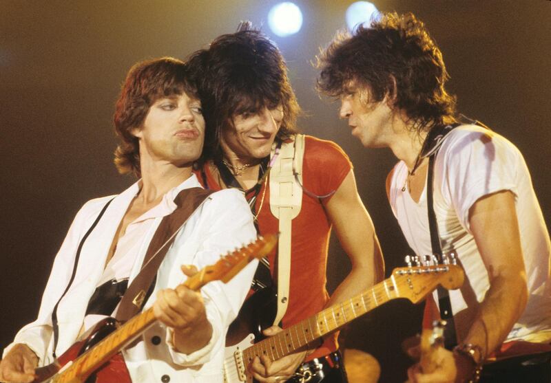 CANADA - APRIL 01: Photo of ROLLING STONES; L-R: Mick Jagger, Ron Wood (Ronnie Wood) and Keith Richards (all playing guitars) performing live onstage at the Oshawa Civic Auditorium, playing a benefit concert after Keith Richards' drug bust (Photo by Richard E. Aaron/Redferns)