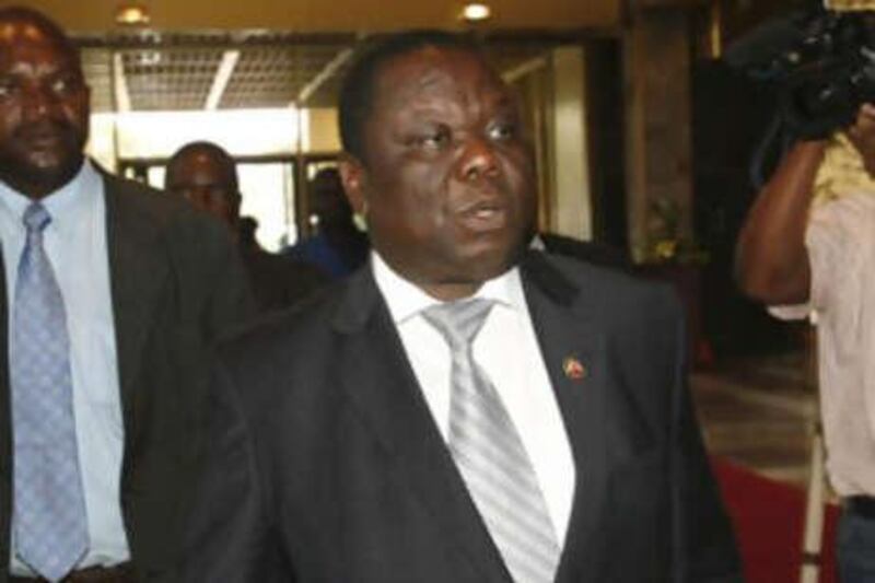 Zimbabwe's Movement for Democratic Change (MDC) leader Morgan Tsvangirai arrives for talks at the Rainbow Towers hotel in Harare Oct 17.