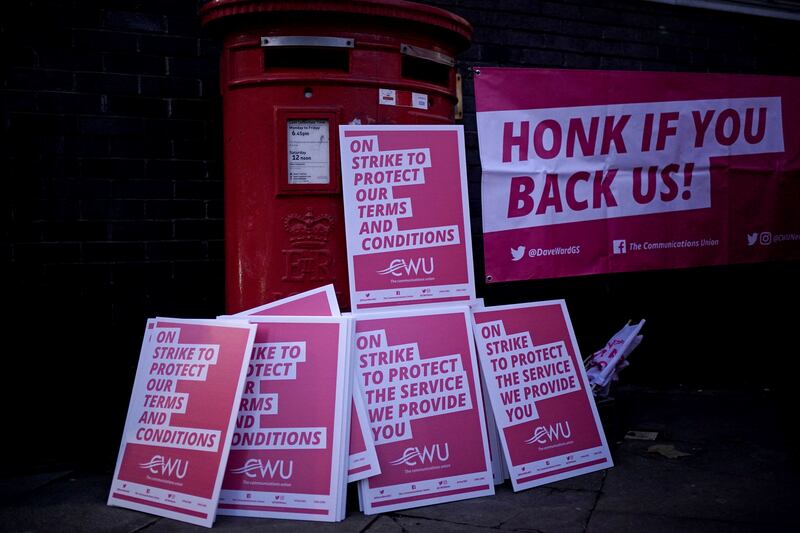 Placards stacked by postal workers at the Camden Town Delivery Office in north-west London. AP