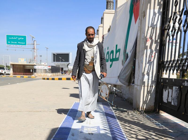 An Israeli flag on the ground in Sanaa, after the Houthis attacked a Norway-flagged tanker off Yemen. EPA